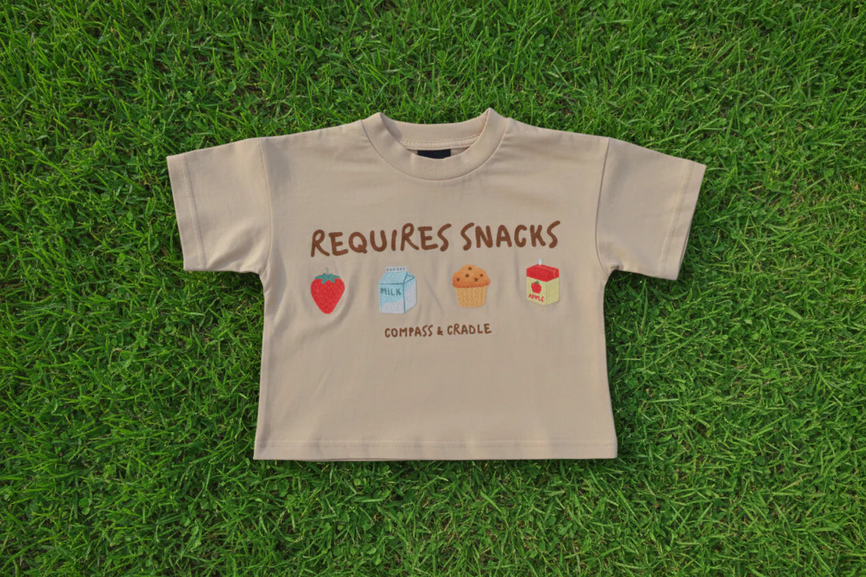Requires Snacks Tee